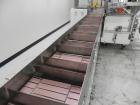 Used Adco Model 15DBC105-EC Automatic Horizontal Cartoner. Capable of speeds from 50 to 125 cartons per minute. Has two head rotary carton feed with 4' long magazine. Machine is set on 12