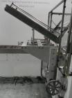 Used Adco Model 15DBC105-EC Automatic Horizontal Cartoner. Capable of speeds from 50 to 125 cartons per minute. Has two head rotary carton feed with 4' long magazine. Machine is set on 12