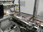 Used Adco Model 15DBC105-EC Automatic Horizontal Cartoner. Capable of speeds from 50 to 125 cartons per minute. Has two head rotary carton feed with 4' long magazine. Machine is set on 12