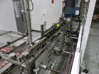 Used Adco Model 15DBC105-EC Automatic Horizontal Cartoner. Capable of speeds from 50 to 125 cartons per minute. Has two head rotary carton feed with 4' long magazine. Machine is set on 12