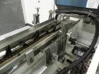 Used Adco Model 15DBC105-EC Automatic Horizontal Cartoner. Capable of speeds from 50 to 125 cartons per minute. Has two head rotary carton feed with 4' long magazine. Machine is set on 12