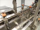 Used Adco Model 15DBC105-SS Horizontal Automatic Load Glue Cartoner.