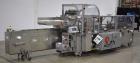 Used Adco Model JET-BC-SS Stainless Steel Automatic Load Cartoner Capable of speeds up to 120 cartons per minute