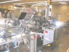 Used: Uhlmann C2205 automatic horizontal cartoner capable of speeds up to 300 CPM. Has worm screw bottle feeder, prefolded and sheet fed leaflet feeders, emboss date coders. Unit is on 5