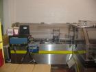 USED: Econocorp model ECM continuous motion auto-load stainless steel cartoner rated up to 100 cpm. Built 2002. Hand wheel size adjustment, lugs currently set on 12