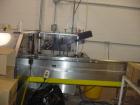 USED: Econocorp model ECM continuous motion auto-load stainless steel cartoner rated up to 100 cpm. Built 2002. Hand wheel size adjustment, lugs currently set on 12
