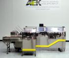 Used Econocorp Spartan Automatic Horizontal Glue Cartoner capable of speeds up to 40 cartons per minute. Has 12