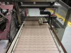 Used Econocorp Spartan Automatic Horizontal Glue Cartoner capable of speeds up to 40 cartons per minute. Has 12