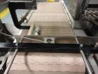 Used Econocorp Spartan Automatic Horizontal Glue Cartoner capable of speeds up to 40 cartons per minute. Has 12