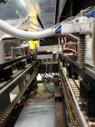 Used Econocorp Spartan Automatic Horizontal Glue Cartoner capable of speeds up to 40 cartons per minute. Has 12
