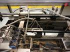 Used Econocorp Spartan Automatic Horizontal Glue Cartoner capable of speeds up to 40 cartons per minute. Has 12