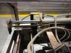 Used Econocorp Spartan Automatic Horizontal Glue Cartoner capable of speeds up to 40 cartons per minute. Has 12