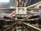 Used Econocorp Spartan Automatic Horizontal Glue Cartoner capable of speeds up to 40 cartons per minute. Has 12