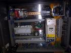 Used Econocorp Spartan Automatic Horizontal Glue Cartoner capable of speeds up to 40 cartons per minute. Has 12