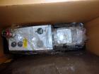 Used Econocorp Spartan Automatic Horizontal Glue Cartoner capable of speeds up to 40 cartons per minute. Has 12