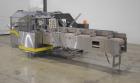 Used Econocorp Econoseal Spartan Automatic Horizontal Intermittent Hotmelt Glue Cartoner. Capable of speeds up to 40 cartons per minute (depending on carton style). Carton size range: 2