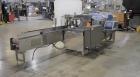 Used Econocorp Econoseal Spartan Automatic Horizontal Intermittent Hotmelt Glue Cartoner. Capable of speeds up to 40 cartons per minute (depending on carton style). Carton size range: 2