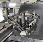 Used Econocorp Econoseal Spartan Automatic Horizontal Intermittent Hotmelt Glue Cartoner. Capable of speeds up to 40 cartons per minute (depending on carton style). Carton size range: 2