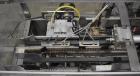 Used Econocorp Econoseal Spartan Automatic Horizontal Intermittent Hotmelt Glue Cartoner. Capable of speeds up to 40 cartons per minute (depending on carton style). Carton size range: 2