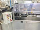 Used Econocorp Spartan Automatic Horizontal Cartoner. Capable of speeds up to 30-50 cartons per minute. Has 12