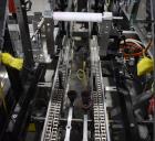 Used Econocorp Econoseal Spartan Automatic Horizontal Intermittent Hotmelt Glue Cartoner. Capable of speeds up to 40 cartons per minute (depending on carton style). Carton size range: 2
