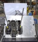 Used Econocorp Econoseal Spartan Automatic Horizontal Intermittent Hotmelt Glue Cartoner. Capable of speeds up to 40 cartons per minute (depending on carton style). Carton size range: 2