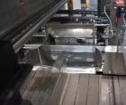 Used Econocorp Econoseal Spartan Automatic Horizontal Intermittent Hotmelt Glue Cartoner. Capable of speeds up to 40 cartons per minute (depending on carton style). Carton size range: 2