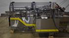Used Econocorp Econoseal Spartan Automatic Horizontal Intermittent Hotmelt Glue Cartoner. Capable of speeds up to 40 cartons per minute (depending on carton style). Carton size range: 2