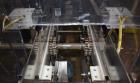 Used Econocorp Econoseal Spartan Automatic Horizontal Intermittent Hotmelt Glue Cartoner. Capable of speeds up to 40 cartons per minute (depending on carton style). Carton size range: 2
