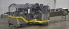 Used Econocorp Econoseal Spartan Automatic Horizontal Intermittent Hotmelt Glue Cartoner. Capable of speeds up to 40 cartons per minute (depending on carton style). Carton size range: 2