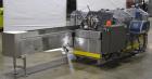 Used Econocorp Econoseal Spartan Automatic Horizontal Intermittent Hotmelt Glue Cartoner. Capable of speeds up to 40 cartons per minute (depending on carton style). Carton size range: 2