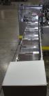 Used Econocorp Econoseal Spartan Automatic Horizontal Intermittent Hotmelt Glue Cartoner. Capable of speeds up to 40 cartons per minute (depending on carton style). Carton size range: 2