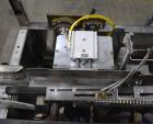 Used Econocorp Econoseal Spartan Automatic Horizontal Intermittent Hotmelt Glue Cartoner. Capable of speeds up to 40 cartons per minute (depending on carton style). Carton size range: 2