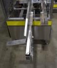 Used Econocorp Econoseal Spartan Automatic Horizontal Intermittent Hotmelt Glue Cartoner. Capable of speeds up to 40 cartons per minute (depending on carton style). Carton size range: 2