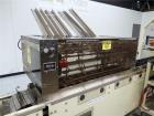 Used FMS Serpa Model 2100 MIAL Automatic Horizontal Glue Cartoner.