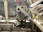 Used FMS Serpa Model 2100 MIAL Automatic Horizontal Glue Cartoner.