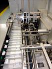 Used IWKA Model CP150 Automatic Horizontal Tube Cartoner. Capable of speeds up to 150 cartons per minute. Carton size: (Length) 20mm-90mm, (Width) 15mm-60mm, (Depth) 55mm-180mm. Set up for Reverse tu...