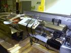 Used Jones Criterion 2000 (IM-C2K) Automatic Intermittent Motion Horizontal Cartoner. Capable of speeds from 20 to 66 cartons per minute. Reverse Tuck flap closures   Has 6