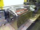 Used Jones Criterion 2000 (IM-C2K) Automatic Intermittent Motion Horizontal Cartoner. Capable of speeds from 20 to 66 cartons per minute. Reverse Tuck flap closures   Has 6