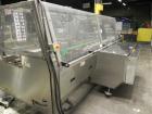 Used Kliklok (Woodman) Model SFR Automatic Horizontal Cartoner capable of speeds from 30 to 120 cartons per minute. 12
