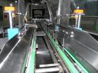 Used Kliklok (Woodman) Model SFR Automatic Horizontal Cartoner. Capable of speeds from 30 to 120 cartons per minute. Unit set on 15