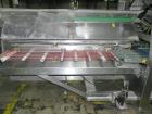 Used Kliklok (Woodman) Model SFR Automatic Horizontal Cartoner. Capable of speeds from 30 to 120 cartons per minute. Unit set on 15