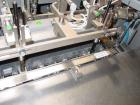 Used Marchesini Horizontal Cartoner, model BA100. Machine is capable of speeds up to 120 cpm. Horizontal intermittant motion cartoner set up for glue style cartons with embosse date coder and automat...