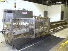 Used Tisma Automatic Horizontal Glue Cartoner, Model 600-SE. Capable of speeds over 200 CPM. Has 5