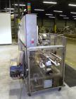 Used Tisma Automatic Horizontal Glue Cartoner, Model 600-SE. Capable of speeds over 200 CPM. Has 5