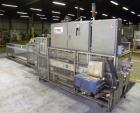 Used Tisma Automatic Horizontal Glue Cartoner, Model 600-SE. Capable of speeds over 200 CPM. Has 5