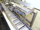 Used Tisma Automatic Horizontal Glue Cartoner, Model 600-SE. Capable of speeds over 200 CPM. Has 5