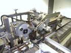 Used Tisma Automatic Horizontal Glue Cartoner, Model 600-SE. Capable of speeds over 200 CPM. Has 5