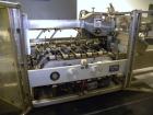 Used Tisma Automatic Horizontal Glue Cartoner, Model 600-SE. Capable of speeds over 200 CPM. Has 5