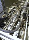 Used Tisma Automatic Horizontal Glue Cartoner, Model 600-SE. Capable of speeds over 200 CPM. Has 5